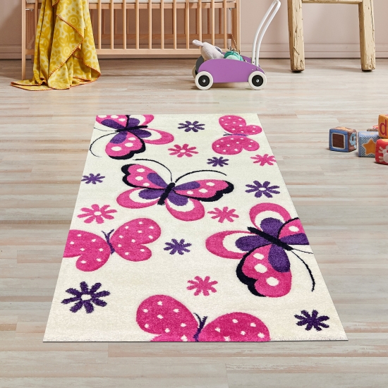 Teppich fürs Kinderzimmer mit Schmetterlingsmuster in creme pink läufer