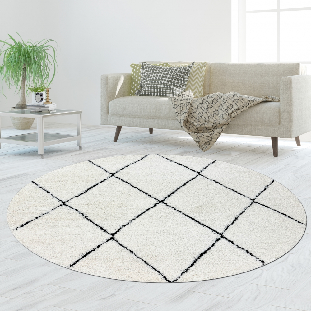 Eleganter Teppich mit Rautenmuster in Schwarz und Weiß