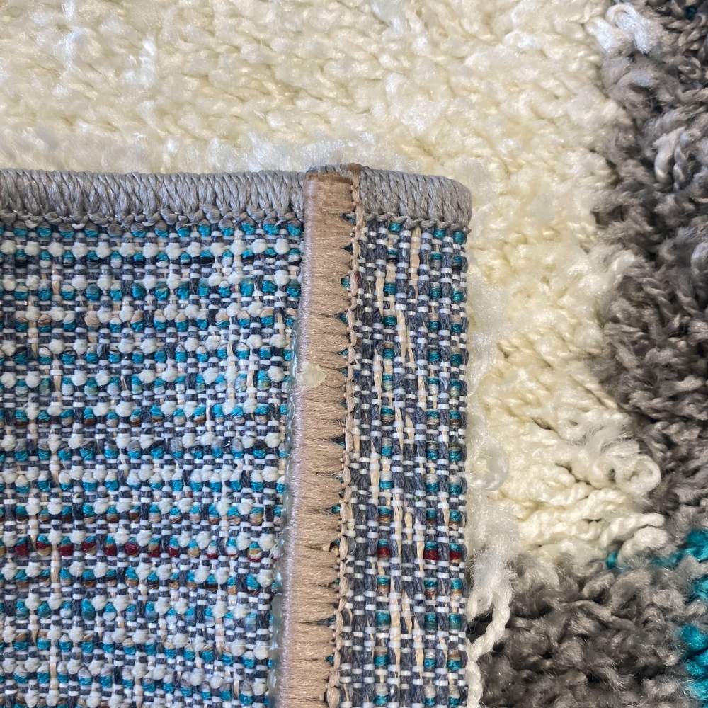 Shaggy Teppich in Karo Design Türkis Grau Cream