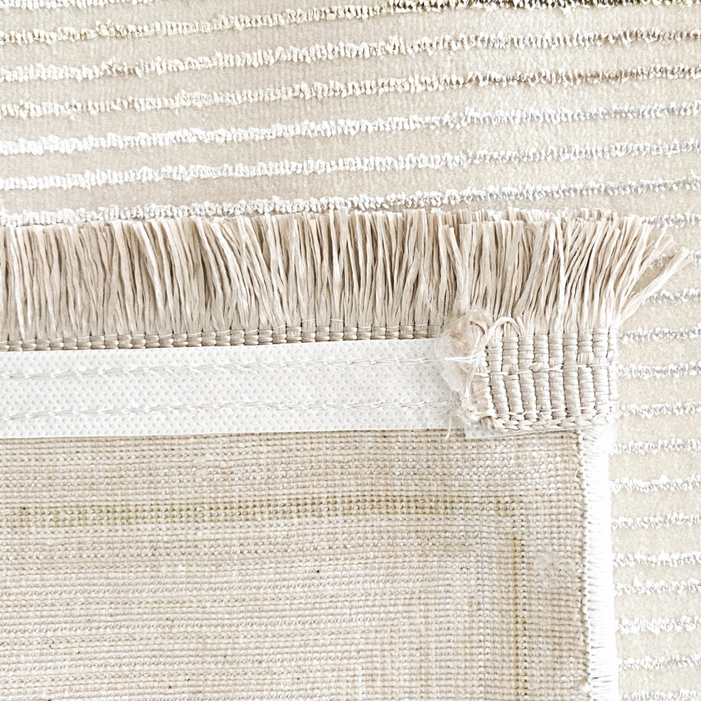 Edler Wohnzimmer Teppich mit Fransen in creme gold