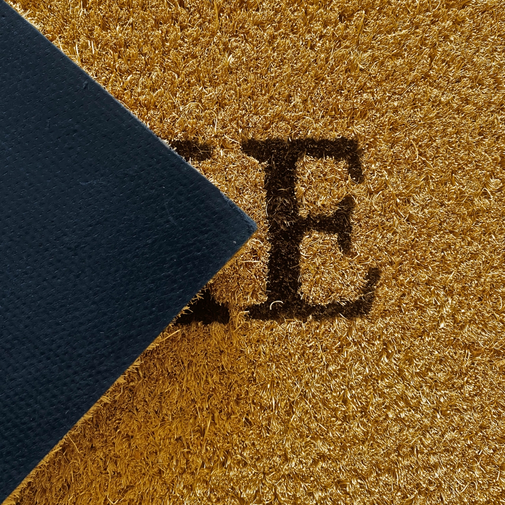 Fußmatte Willkommen Verzierungen in schwarz